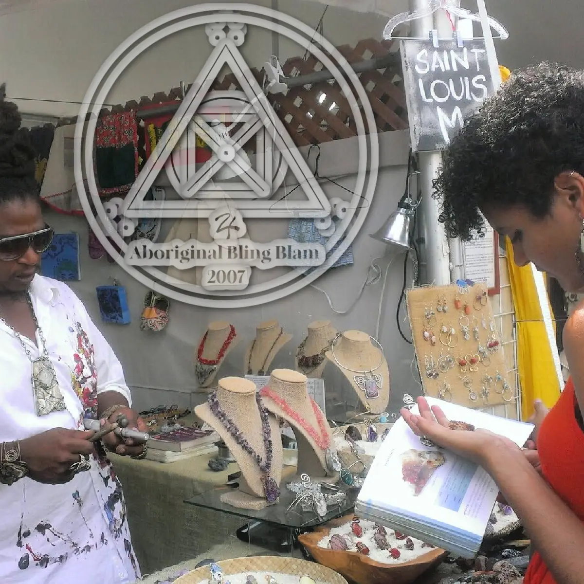 Patron reading about stone at booth.